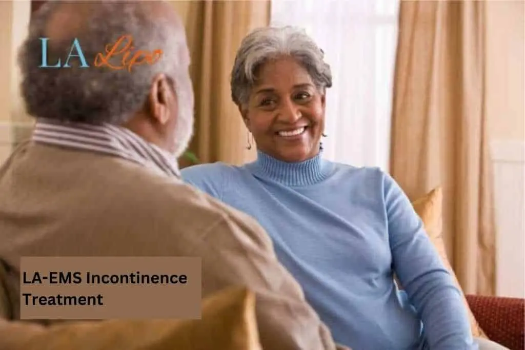 Couple sat smiling at each other - LA-EMS treatment Ruislip Common