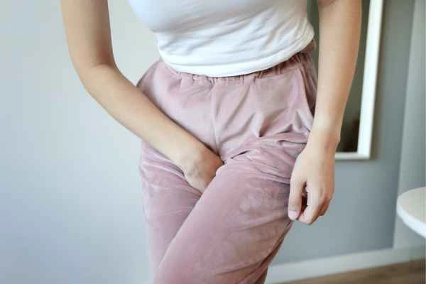 woman running for the toilet because of urinary incontinence Ruislip Common